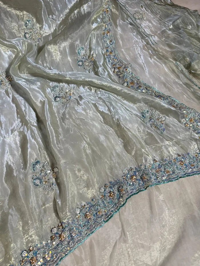 Subtle Metallic Sea Green Shimmery Tissue Silk Designer Saree - Image 2